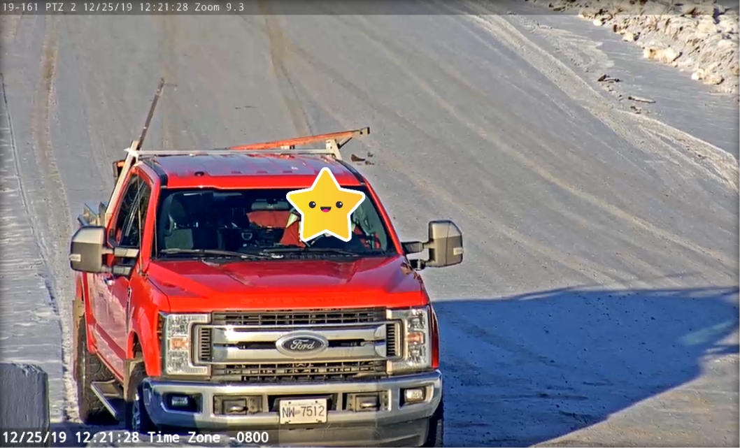A red pickup truck carrying equipment for a site caught by Whitetail rental's installed CCTVs