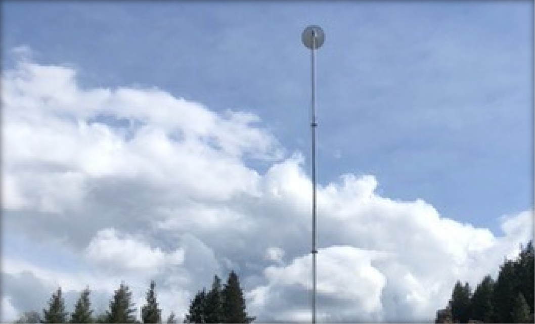 A remote communication tower installed by Whitetail Rentals at a site